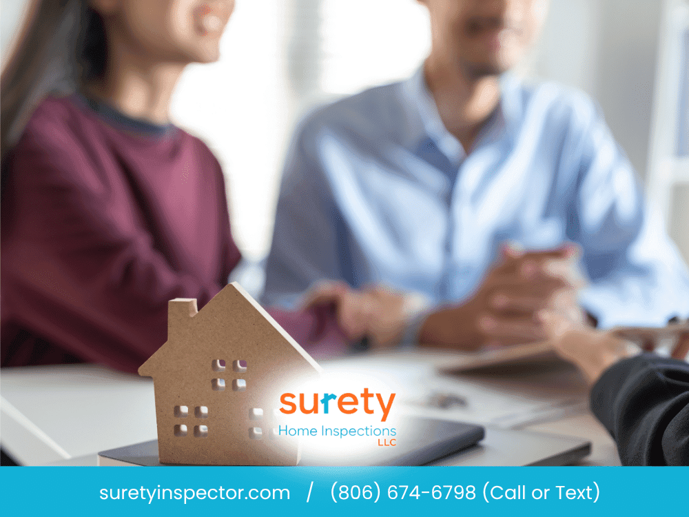 Homebuyers reviewing a model home with a licensed home inspector in Arlington TX during a pre-purchase inspection consultatio